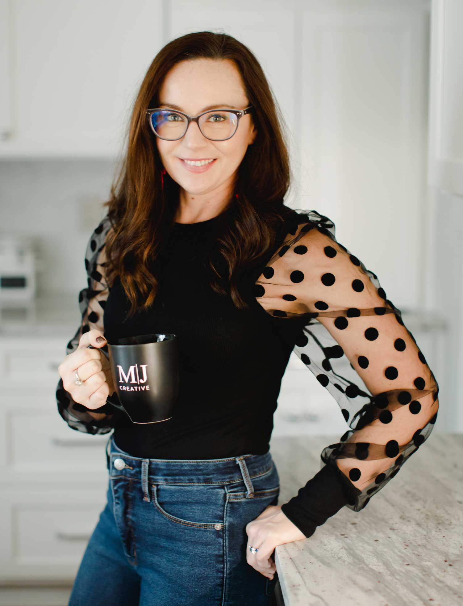 Best Charlotte Web Designer drinking coffee