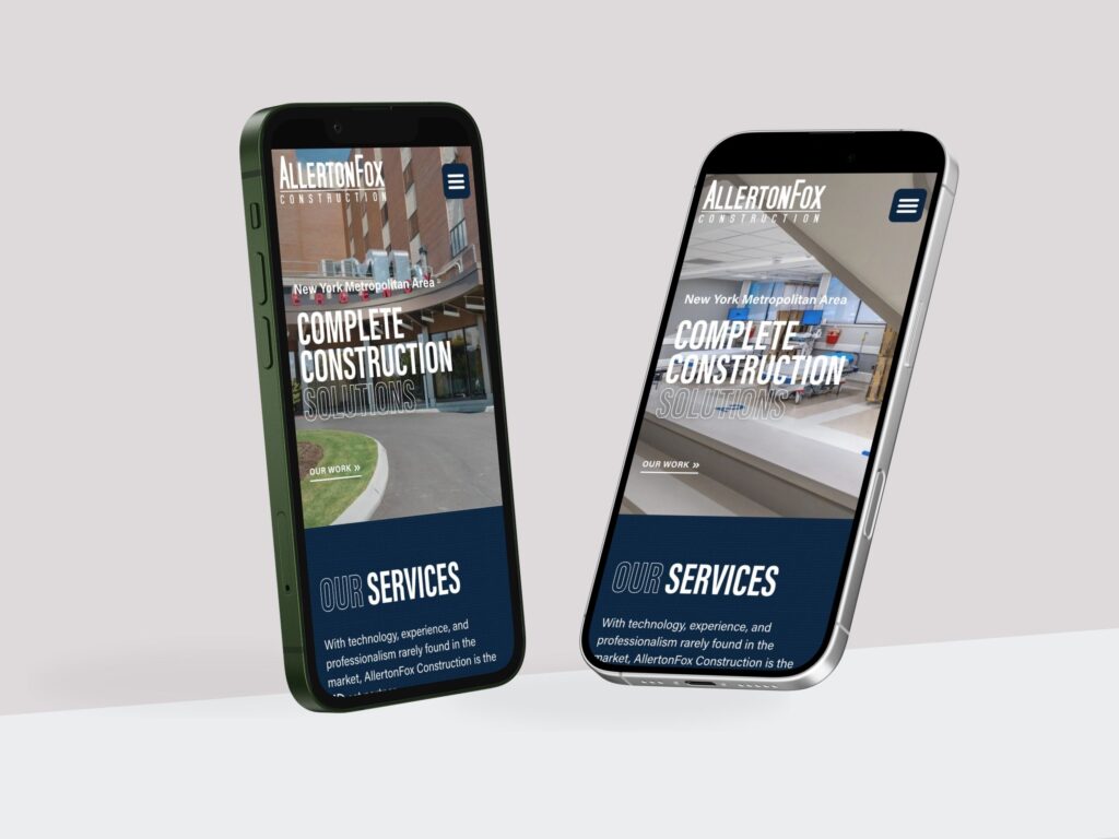 Smartphones displaying construction company mobile website design